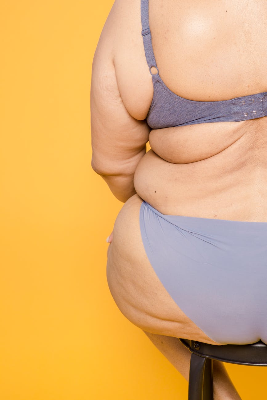 unrecognizable overweight woman in lingerie