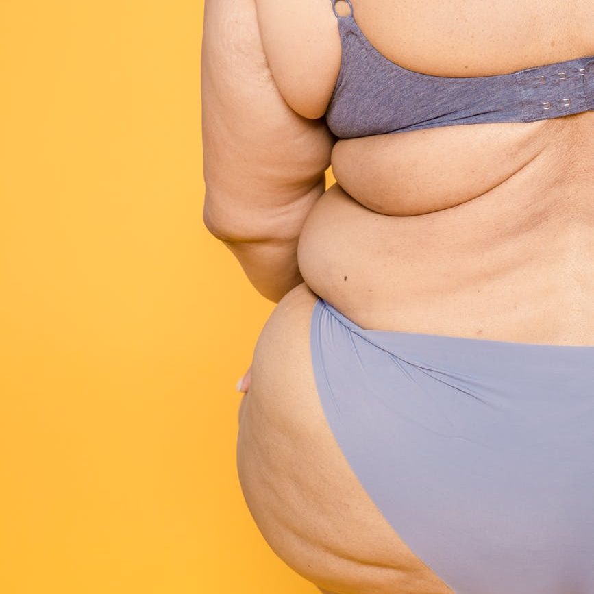 unrecognizable overweight woman in lingerie